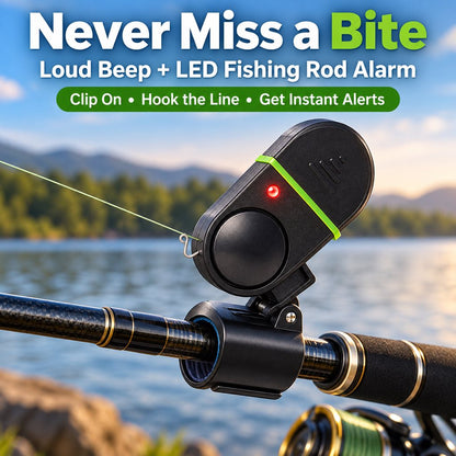 Fishing bite alarm with LED and sound alert clipped to fishing rod